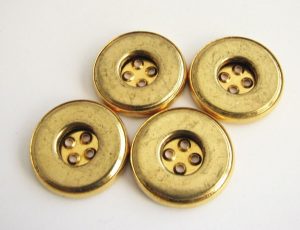 botones dorados